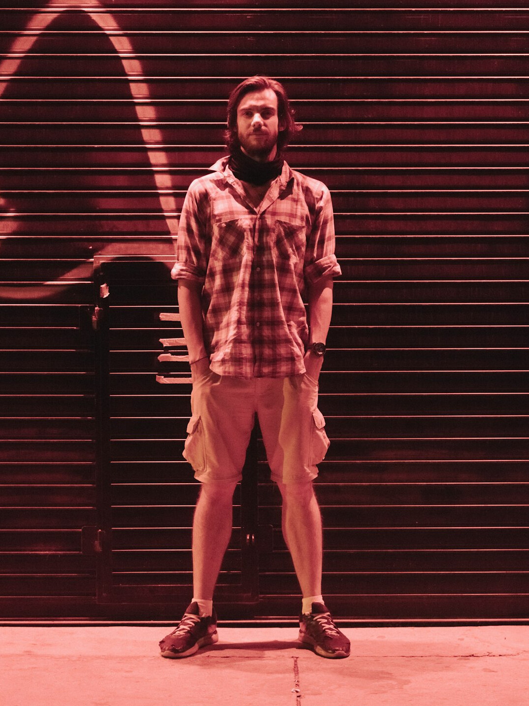Portrait of a bearded man sound engineer wearing a casual shirt